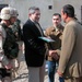 Wolfowitz Presents Certificate of Occupancy to Mosul Resident