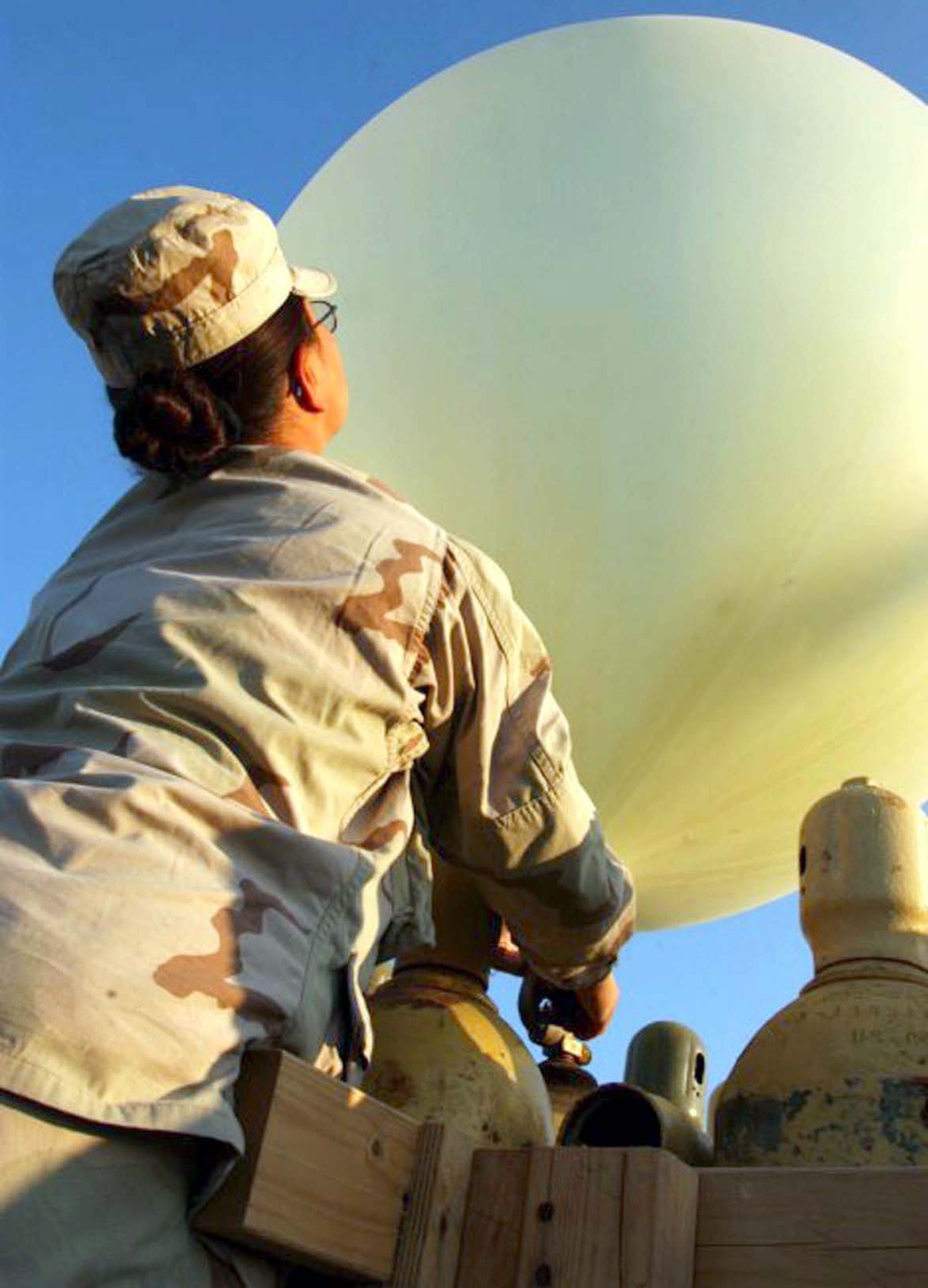 Meteorological Specialist Launches Weather Balloon to Support Artillery Operations in Iraq