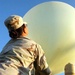 Meteorological Specialist Launches Weather Balloon to Support Artillery Operations in Iraq