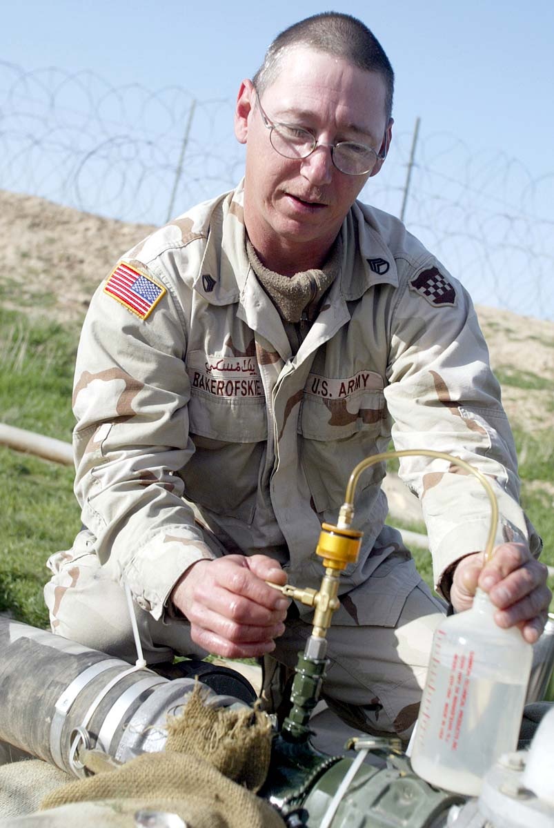 Army Sergeant Checks Fuel Quality to Support Medical Mission in Afghanistan