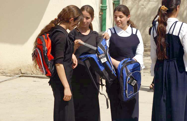 Iraqi Students Receive Donated Backpacks from U.S. Soldiers