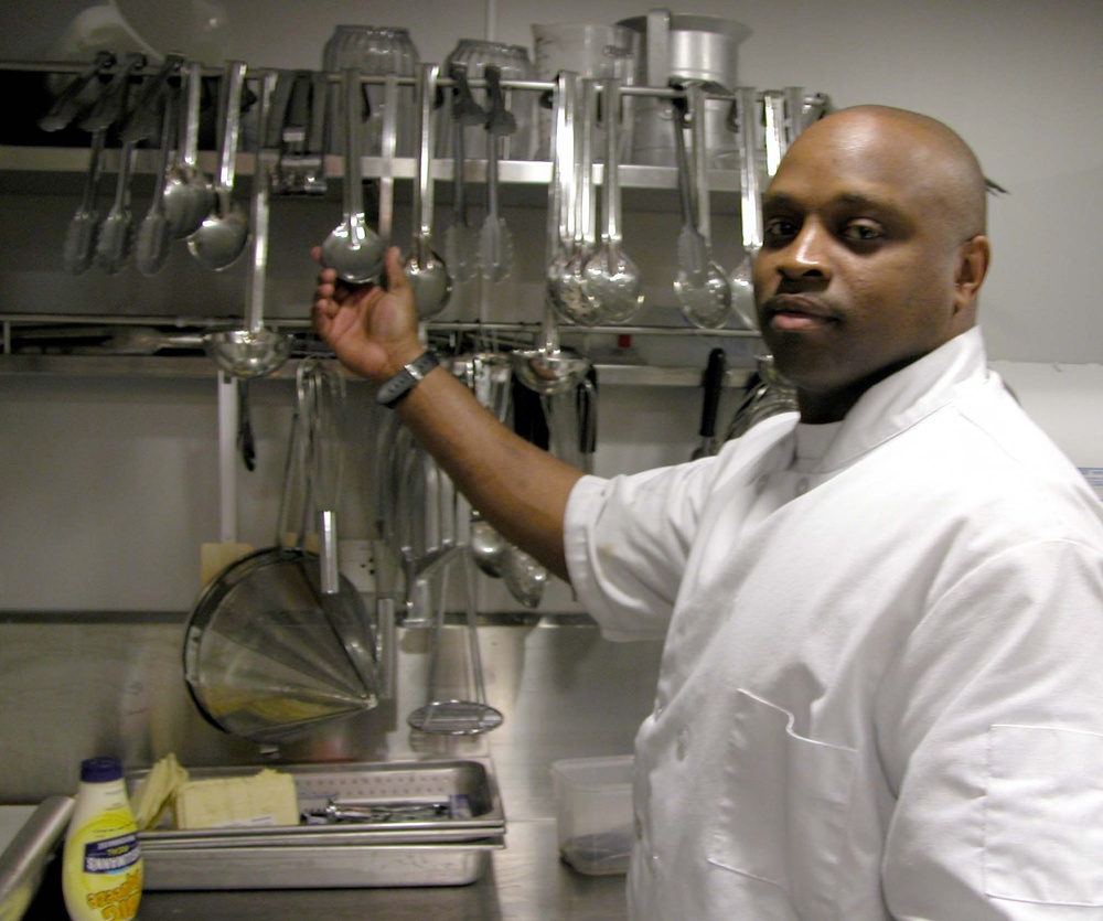 Navy Petty Officer Feeds Crew Aboard Swift Ship