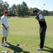 Tiger Woods Provides Golf Instruction to Son of Army Command Sergeant Major