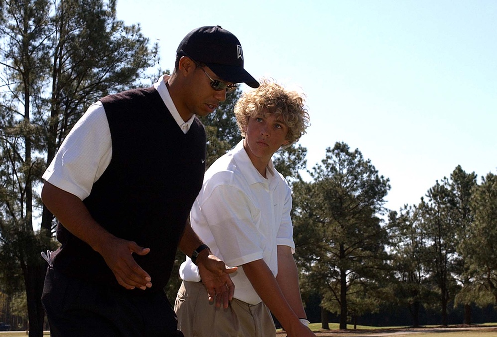 Tiger Woods Offers Golf Instruction to Soldier at Fort Bragg Clinic