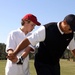 Tiger Woods Mentors Young Golfer Ty Boley at Fort Bragg Clinic