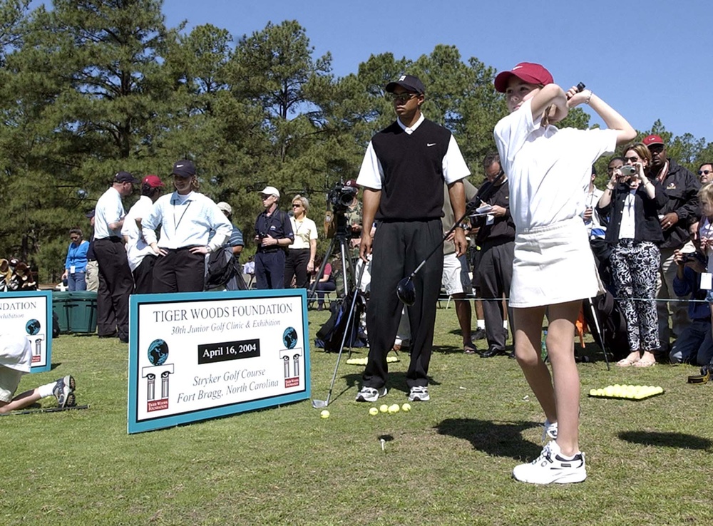 Tiger Woods Mentors Young Golfer at Fort Bragg Clinic