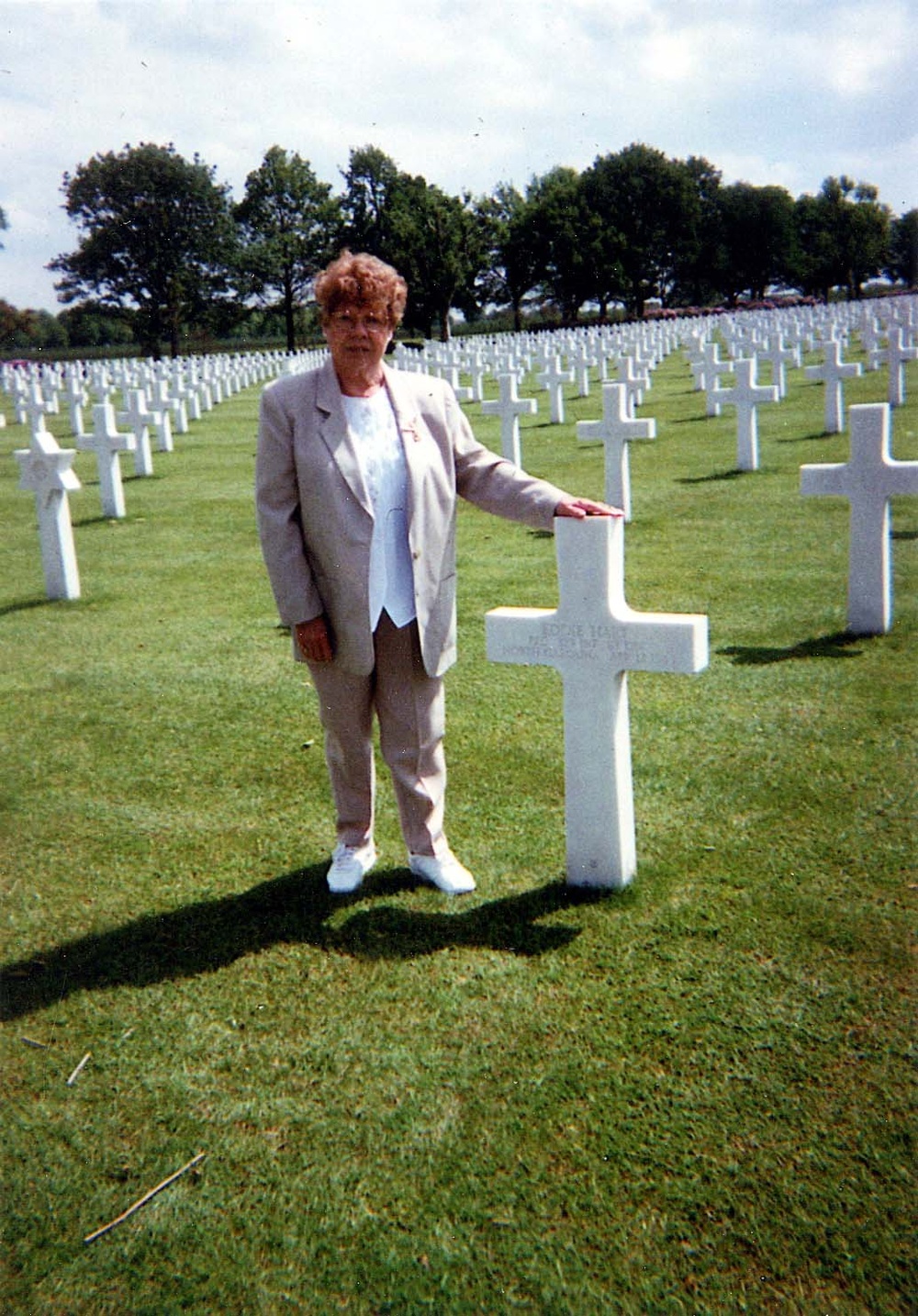 Woman Honors WWII Soldier's Grave Decades Later