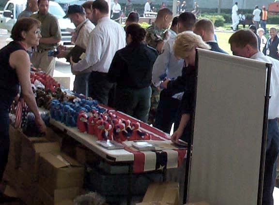 Tonie Negrin Distributes Teddy Bears to Service Members at Pentagon