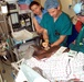 Doctors Administer Regional Anesthesia Nerve Block to Wounded Soldier