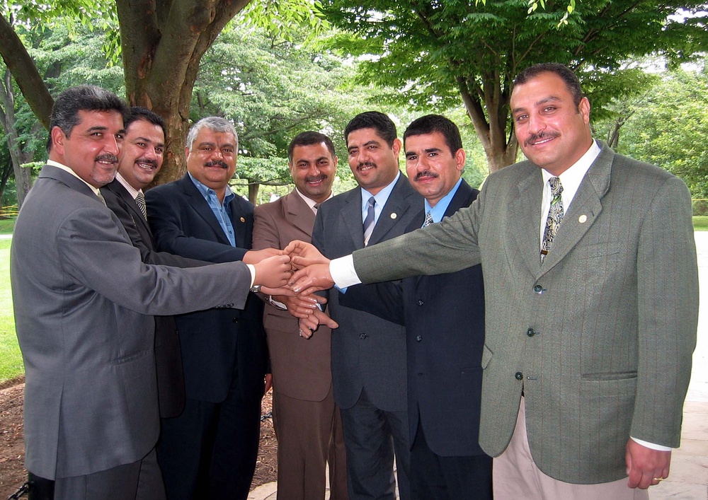 Iraqis Proudly Display New Prosthetic Hands After Amputations Under Saddam Hussein