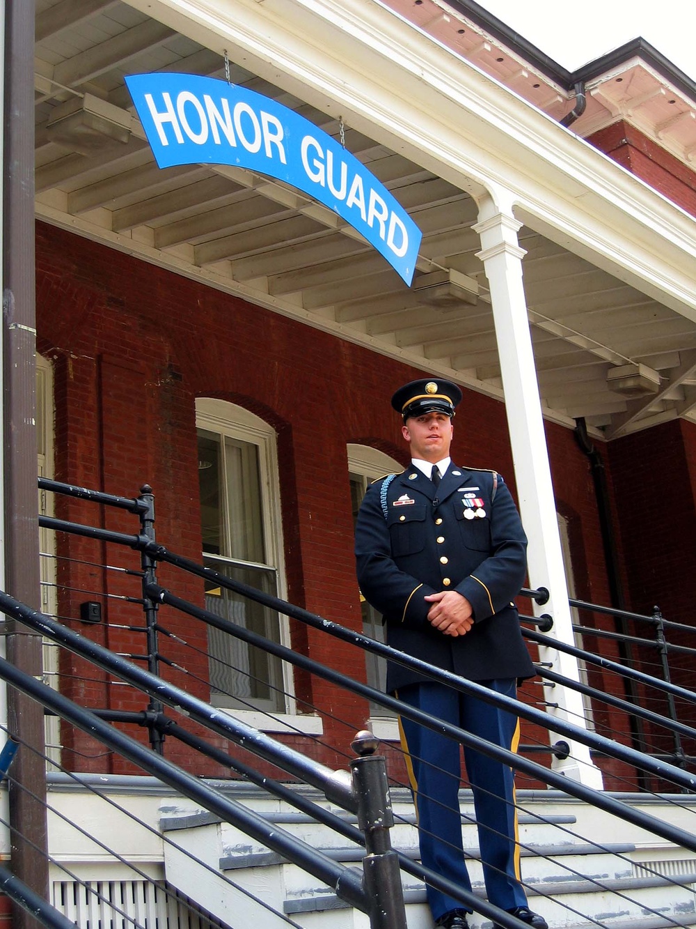 Army Spc. Poses for Photo with Ceremonial Unit