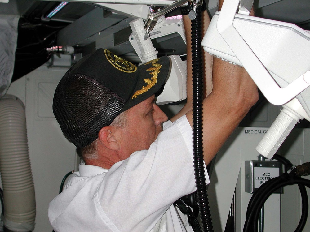 Electrical Engineer Installs Surgical Lights in Expandable Medical Shelter