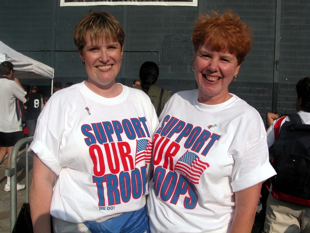 USO Officials Distribute Tickets to Military Families for Armed Forces Celebration