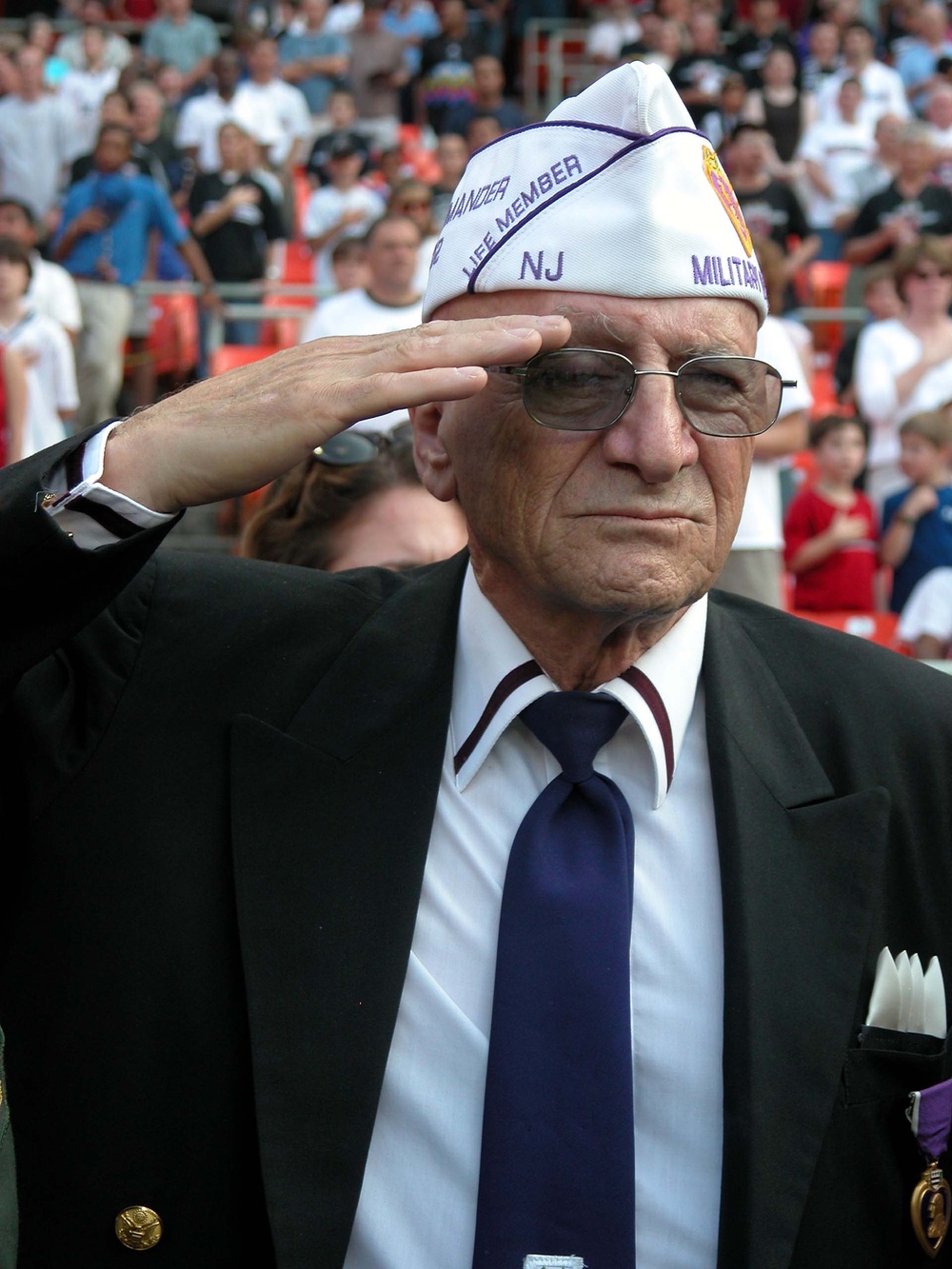 Purple Heart Leader Salutes Flag at Armed Forces Appreciation Day
