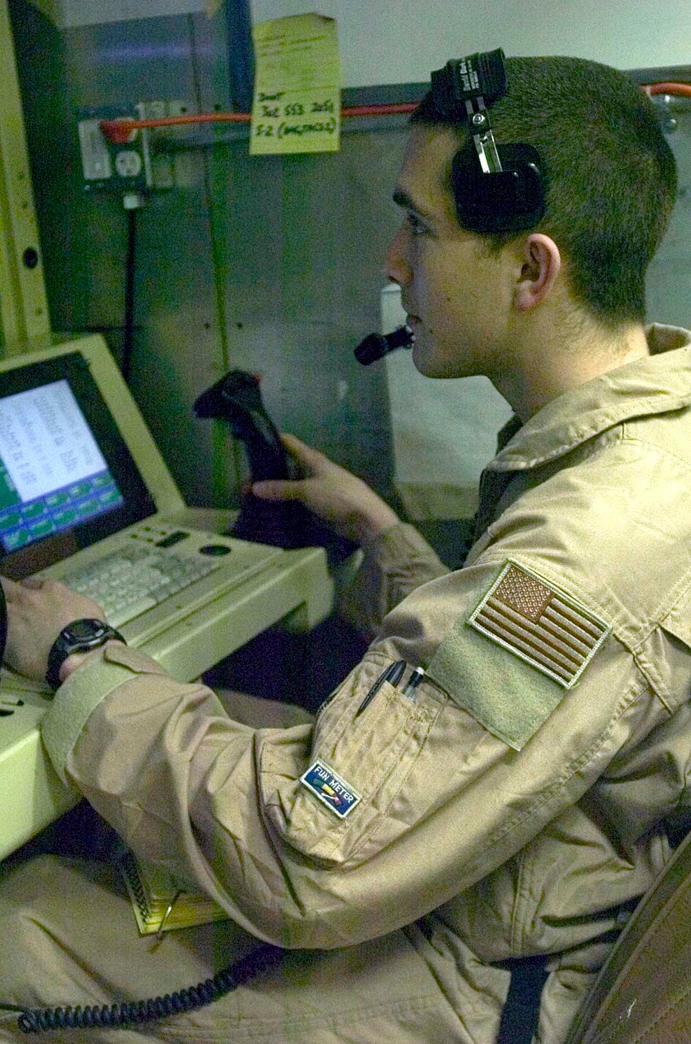 Airman Pilots Predator Drone from Ground Control