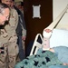 Rumsfeld Visits Purple Heart Recipient at Mosul Hospital