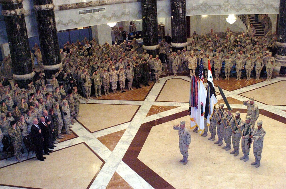 Troops Salute Flag at Iraq Transfer-of-Authority Ceremony