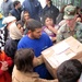 U.S. Army Major Distributes Aid to Needy Families in Kosovo
