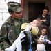 U.S. Soldier Comforts Kosovo Resident During Humanitarian Mission