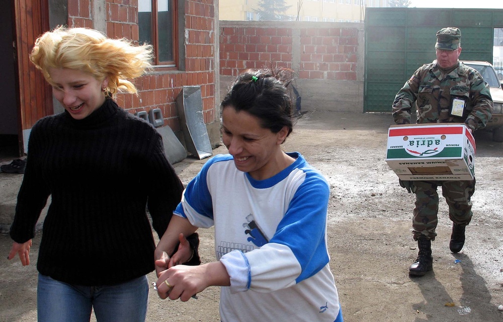 U.S. Troops Donate Lunch Items to Families in Need During Kosovo Humanitarian Mission