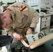 Army Medic Troubleshoots Suction Apparatus for Wound Care