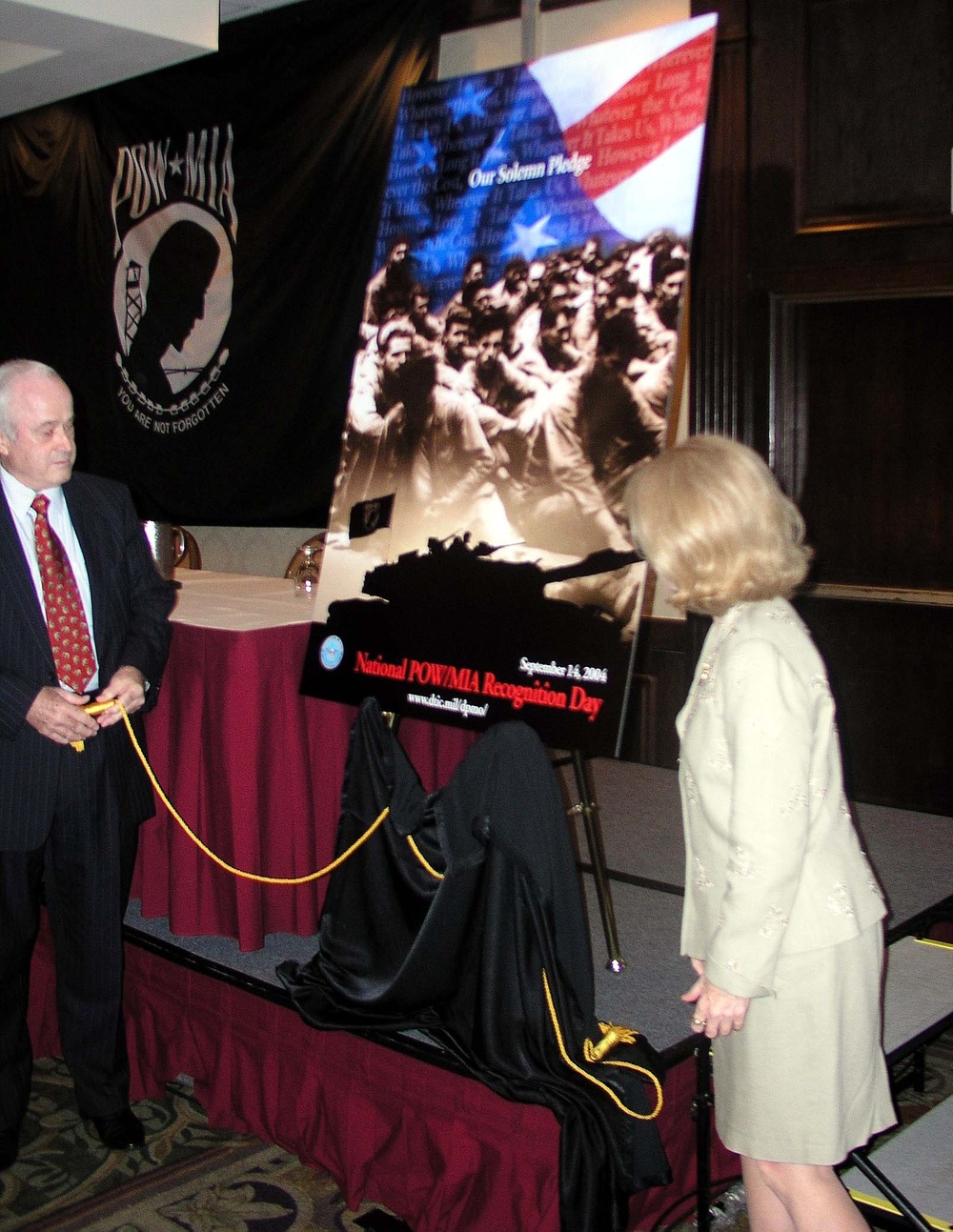Defense Official Unveils 2004 POW/MIA Recognition Day Poster