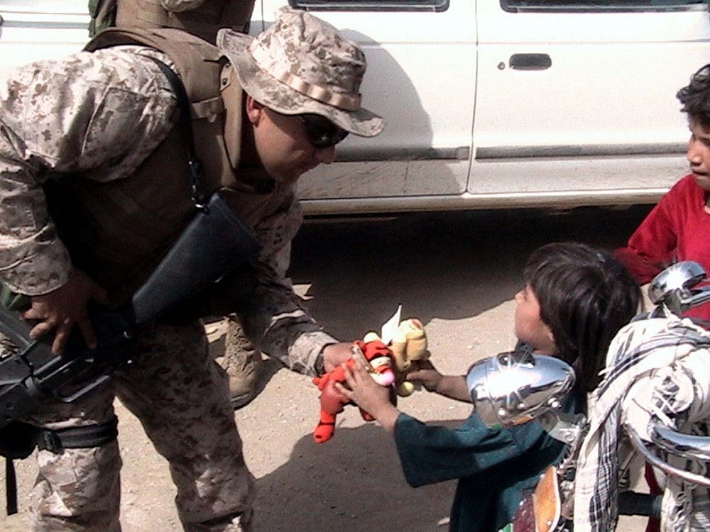 U.S. Soldier Shares Donated Beanie Baby with Afghan Child