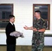 Minnesota Soldier Presents Iraqi Uniform to Local Resident