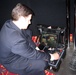Army Engineer Monitors TALON Robot Disabling IEDs