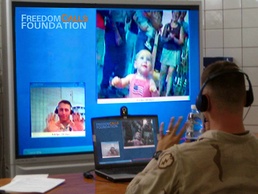 Soldier Sings Happy Birthday to Daughter via Videoconference from Iraq