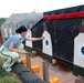 Taddeo Tries Her Hand at Weapons Range in Hawaii