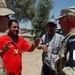 Army Sgt. Communicates with Contract Drivers at Logistics Support Area in Iraq
