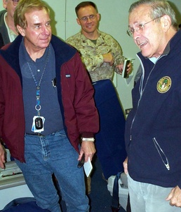 Rumsfeld Discusses Mideast Trip with Reporters Aboard Military Aircraft