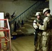 Army Soldiers Search Iraqi House, Discover Shotgun