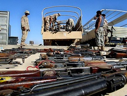 Iraqi National Guard Disposes of Weapons in Baghdad Buyback Program