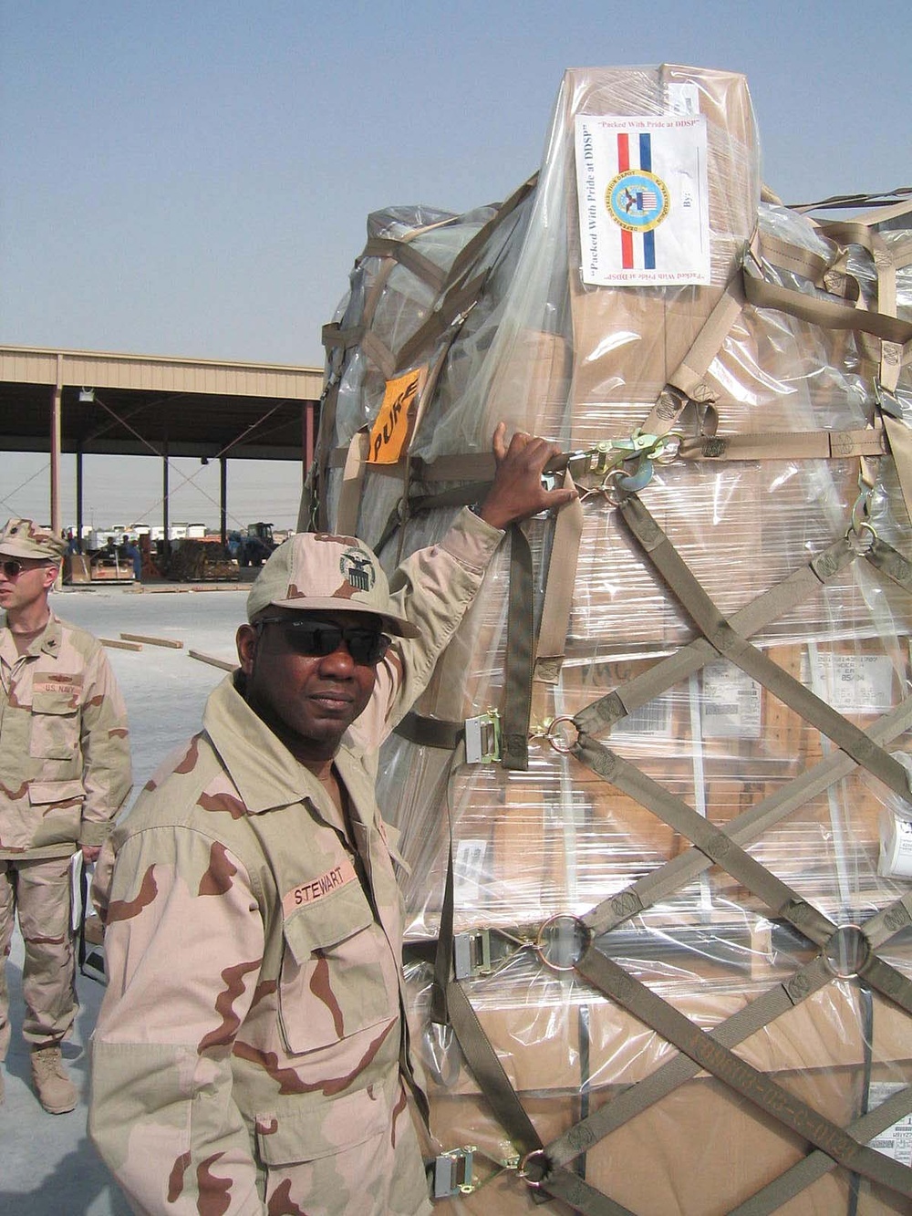 DoD Civilian Volunteers at U.S. Central Command Distribution Deployment Center in Kuwait