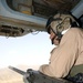 Marine Crew Chief Scans for Threats During Afghanistan Deployment