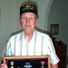 WWII D-Day Veteran Displays Medals for Gallantry in Combat