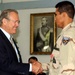 Rumsfeld Honors Salvadoran Soldier for Heroism in Iraq