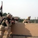 Soldiers Scan Haifa Street Rooftop, Facing Insurgent Threat