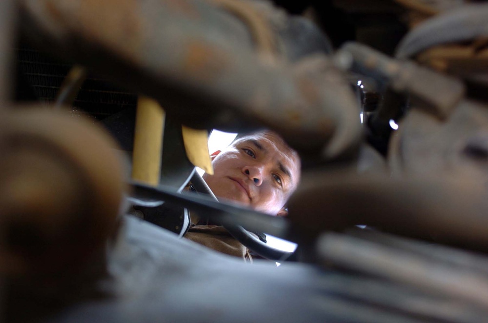 Navajo Soldier Repairs Humvee in Arizona