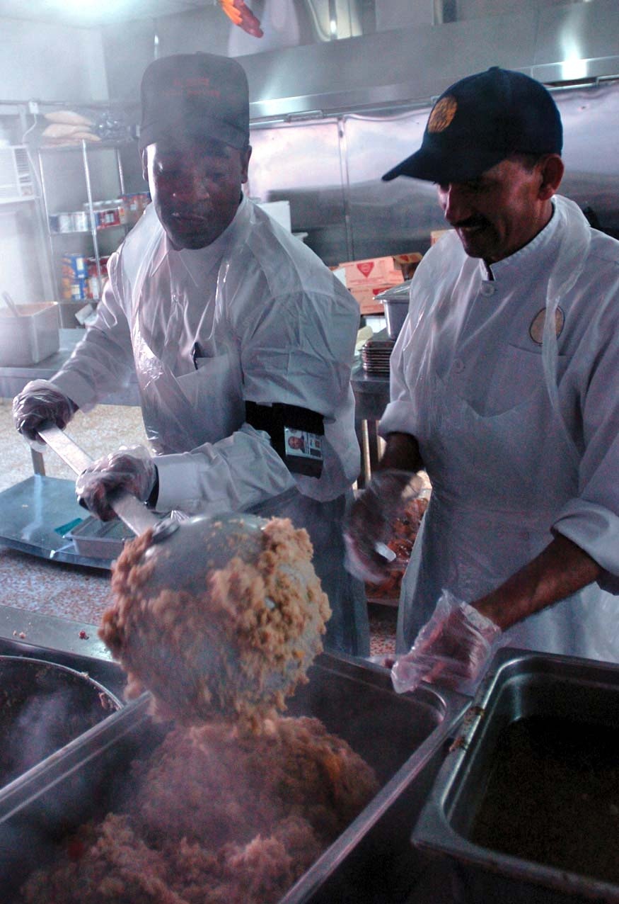 Kellogg, Brown and Root Employee Prepares Thanksgiving Feast for Troops in Iraq