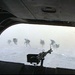 Soldiers Rush from Aircraft in Combat Air Assault