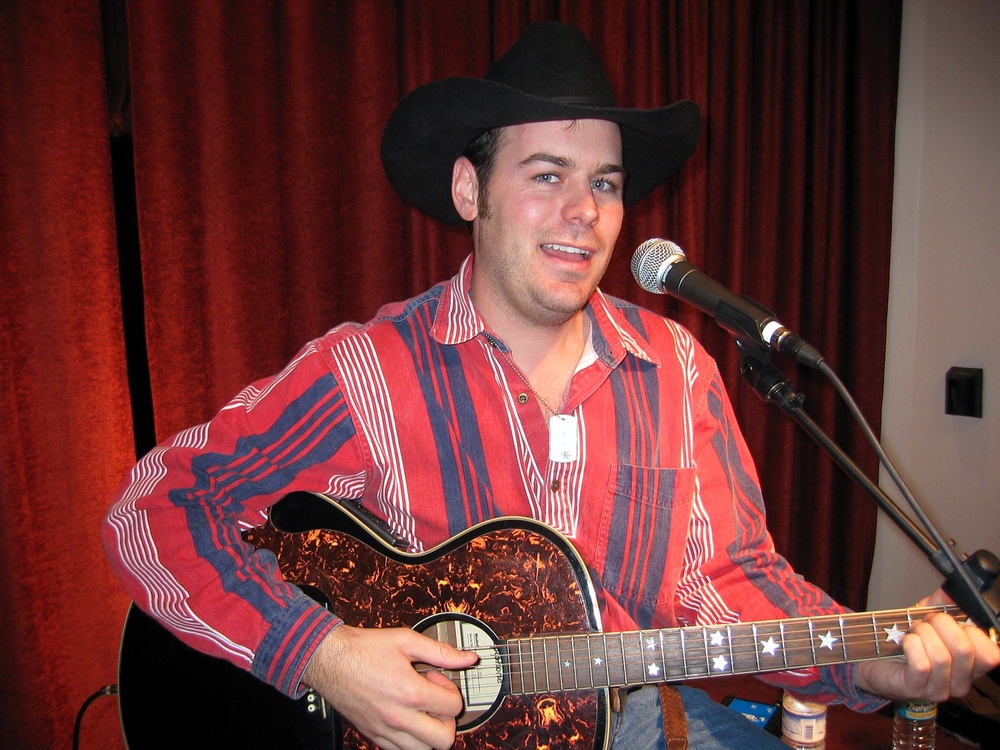 Country Singer Wears 'America Supports You' Dog Tag to Honor U.S. Troops