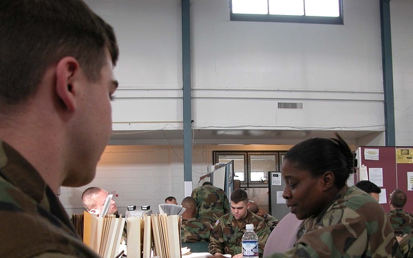 Soldier Outprocessing Assisted by Personnel Services Detachment at Camp Atterbury