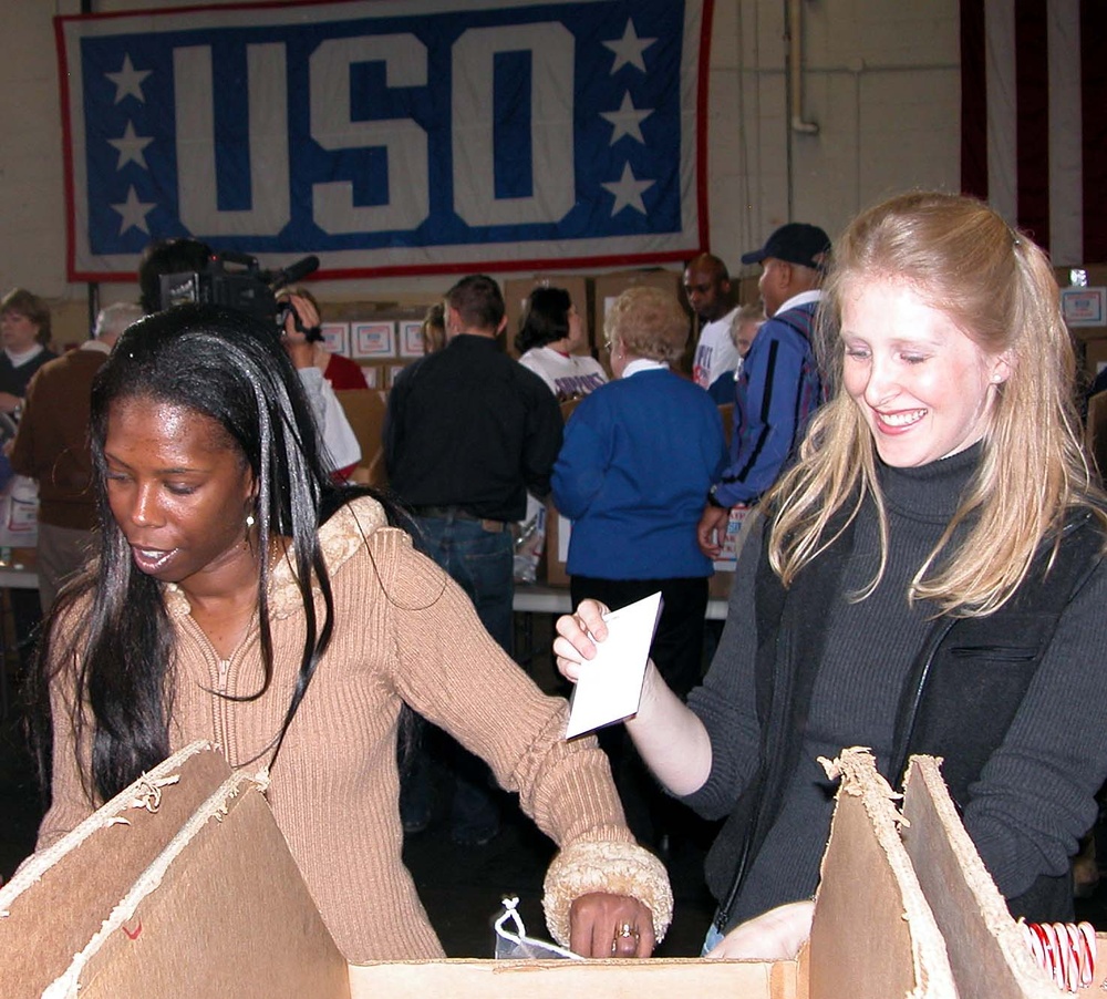 USO Volunteers Fill Care Packages for Troops