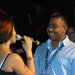 Soldier Dances with Singer at Tribute Concert