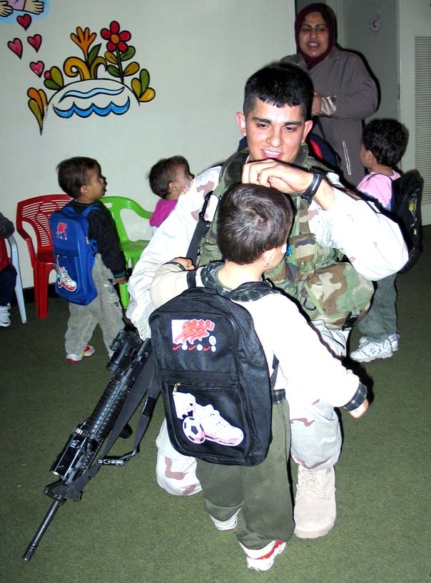 Soldier Brings Joy to Orphans During Humanitarian Mission
