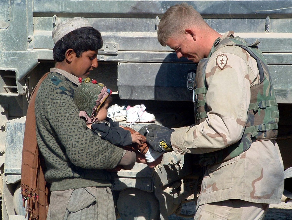 Soldiers Distribute Donated Shoes to Afghan Children