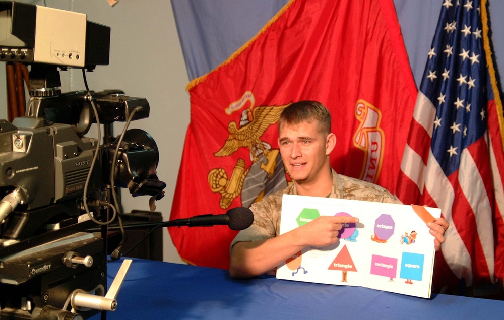 Marine Reads Aboard USS Peleliu